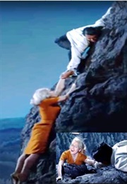 Clinging to Roger's/Cary's Hand in North by Northwest (1959)