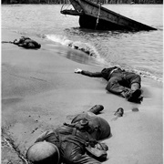 Three Dead Americans on the Beach at Buna (George A. Strock)