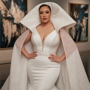 Cape With Exaggerated, Raised Collar