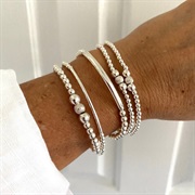 Multiple Bracelets on Bride