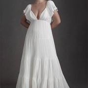 Small Pleats in Fabric of Dress