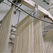 S31.E9: Cotton; Rodeo Roping Chutes; Asian Noodles