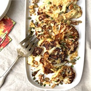 Roasted Cauliflower With Caper Vinaigrette, Walnuts, and Golden Raisins
