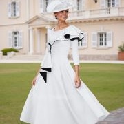 Ruffled Neckline With Contrasting Color Lining Showing