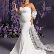 Cape Train Attached to Sleeves on Lower Arms