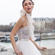 Short Scarf Tied in Bow Around Neck