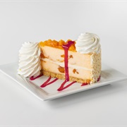 The Cheesecake Factory Peach Perfect With Raspberry Drizzle Cheesecake