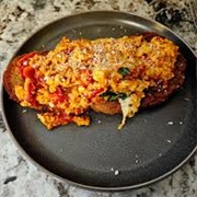 Caraway Rye Bread With Scrambled Eggs and Hot Honey BBQ Sauce