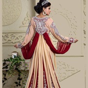 Cape-Like Draping From Back to Sleeves