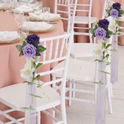 Chairs Decorated With Flowers