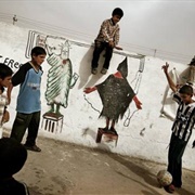 Boys at Play in the Shiite Muslim Suburb of Sadr City, Iraq (Yuri Kozyrev)