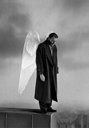 Angel Looking Down Sadly Over Berlin, in Wings of Desire (1987)