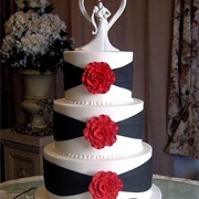 Cake With Colored Wrap on Each Tier