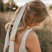 Ribbon Tied in Hair Without Bow
