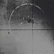 The Last Moments of a US Air Force Recon C-130 Hercules in Gun Camera of the Soviet Union MIG-17...