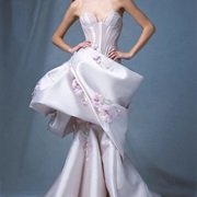 Wide Swoop of Fabric Around Top of Skirt