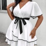 Contrasting Color Piping Around Edges of Dress