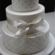 Cake With Bow Around Middle of Tier