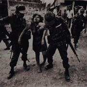 Woman Taken From Her Home by Death Squad (James B. Dickman)