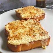 Sesame Sourdough Bread With Melted Marble Cheddar and Worcestershire Sauce