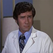 Robert Fuller as Dr. Kelly Brackett