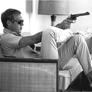 Steve McQueen Takes Aim (John Dominis)