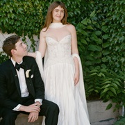 Long Scarf Draped Over Arms