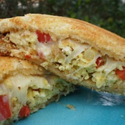 Multigrain Sourdough Bread With Scrambled Eggs, Parmesan, and Red Bell Peppers