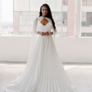 Cape and Neckline Forming Cutout Effect Bodice