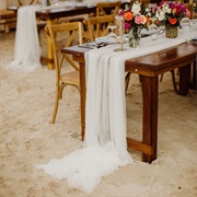 Long Table Runner Pooled on Floor