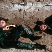 Recruits Under Live Fire Crawl Below Barbed Wire at Parris Island (Thomas Hoepker)