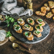 Goat Cheese and Truffle Pesto Crostini