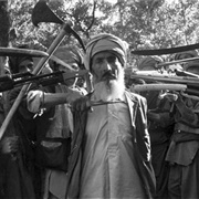 Mujahideen Surround Alleged Traitor (Alain Mingam)