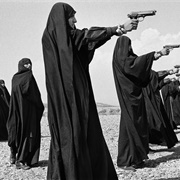 Veiled Women Practice Shooting on the Outskirts of Tehran (Jean Gaumy)