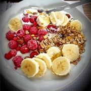 Cereals With Freeze-Dried Raspberries, White Yoghurt Chocolate and Fresh Bananas