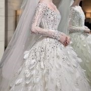 Feathers Combined With Sequins on Gown