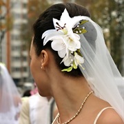 Flowers Combined With Pearls to Hold Veil