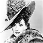 Gypsy Rose Lee as Belle (Belle of the Yukon)