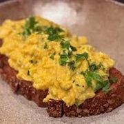 Multigrain Sourdough Bread With Scrambled Eggs and Hot Honey BBQ Sauce
