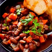 Stewed Beans and Greens With Pickled Red Onions