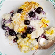 Coconut Rice Pudding With Blueberries, Kumquats, and Walnuts