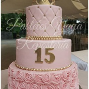 Three-Tier Birthday Cake With Pink and White Icing