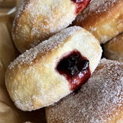 Black Currant Jam Doughnut With Icing Sugar